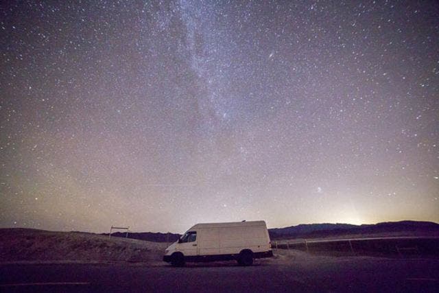 Cyrus Sutton's Van in Death Valley, where he currently camped out editing "Island Earth."