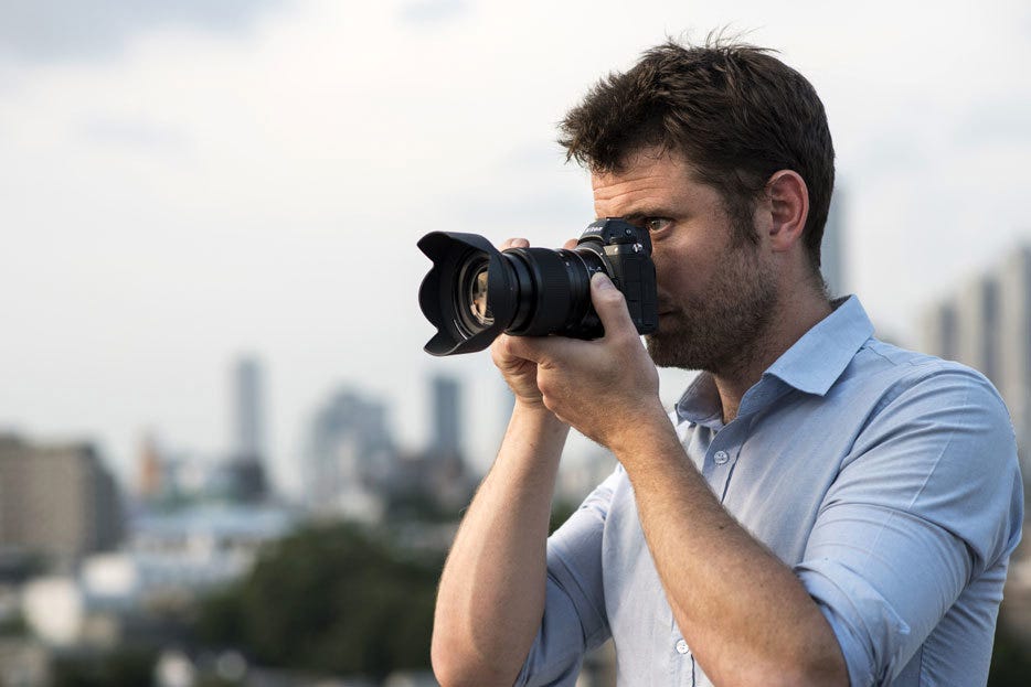 Photographer shooting with a Nikon Z series camera and Z Mount lens