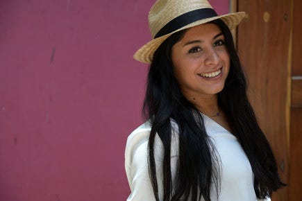 Female model posing for portrait taken with Nikkor Z lens