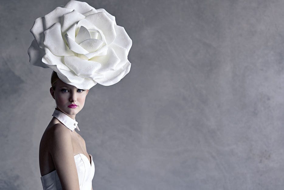 model wearing large flower headdress taken with NIKKOR Z 50mm f/1.8 S Lens