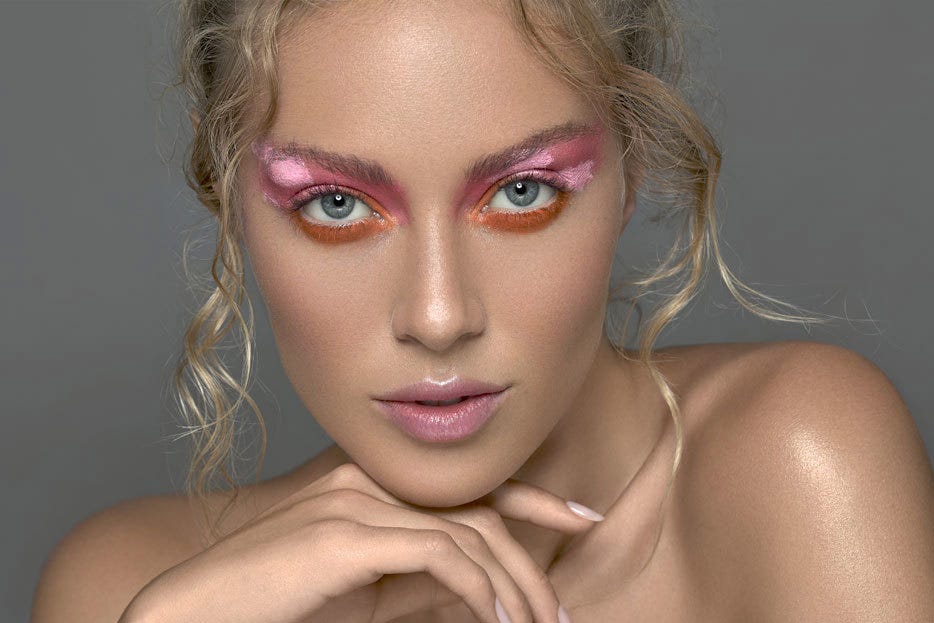 portrait of model with avante garde makeup taken with NIKKOR Z 50mm f/1.8 S Lens
