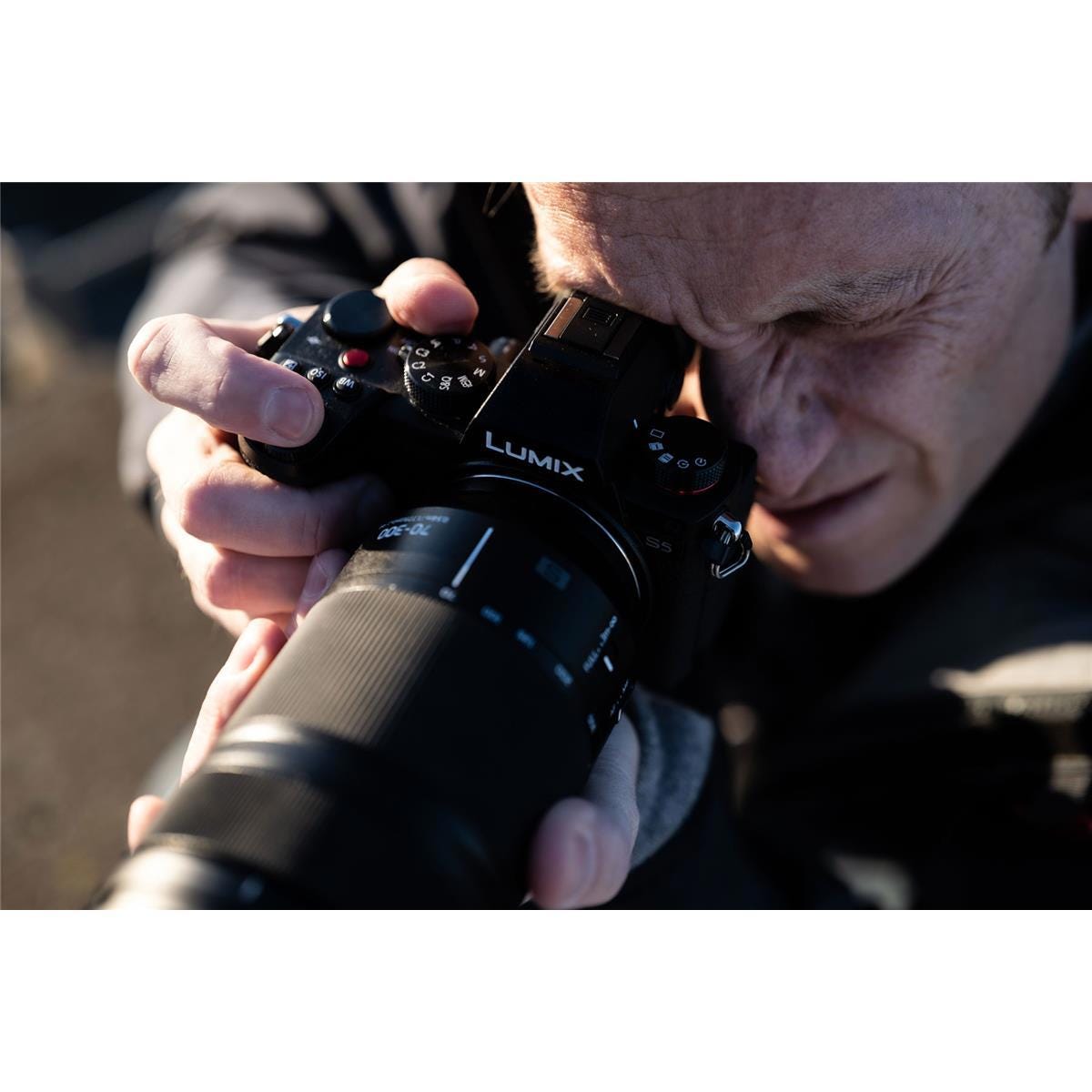 A Telephoto Lens That Shoots Macro Photo & Video.