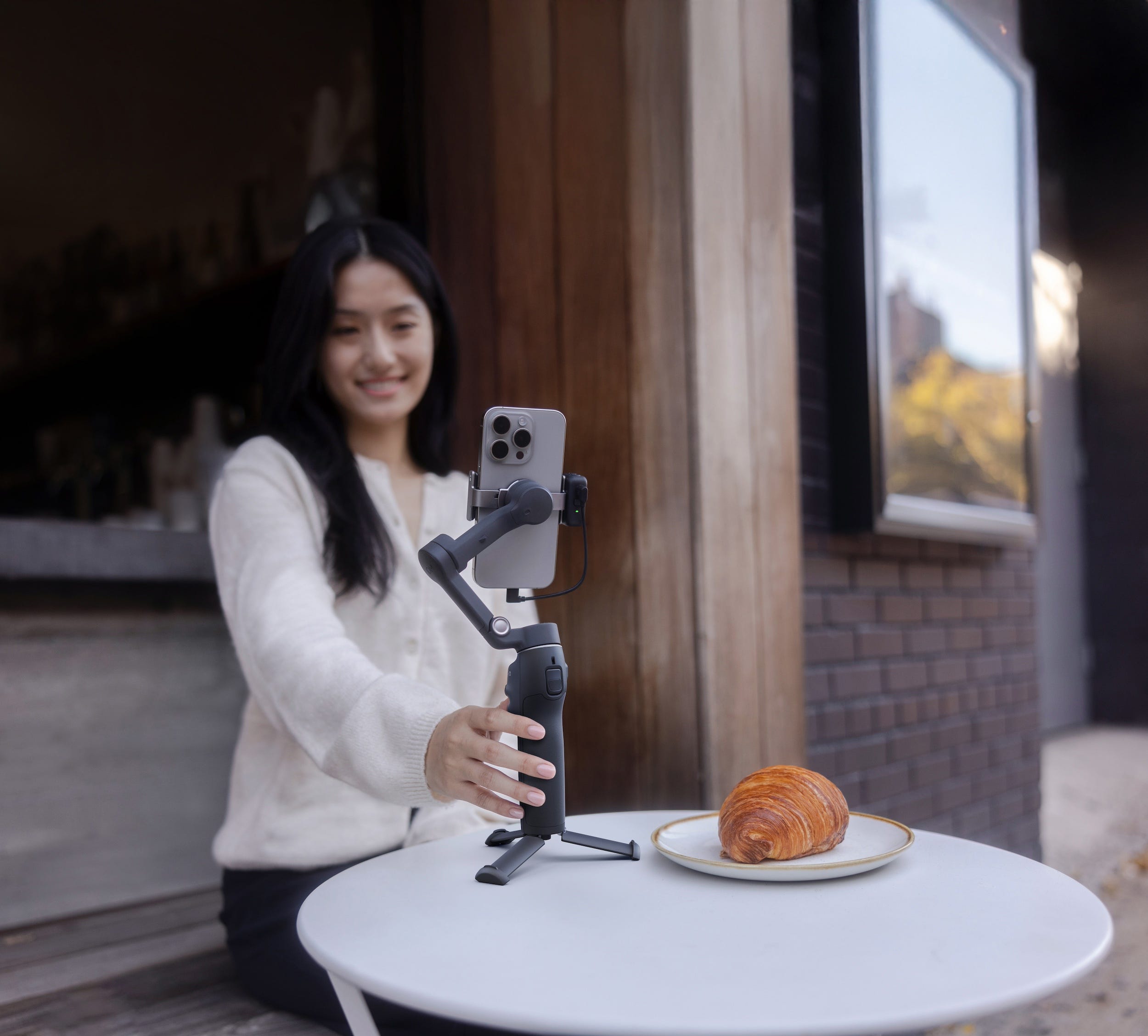 DJI Osmo Mobile 7P eliminates the need for extra accessories with the built-in tripod